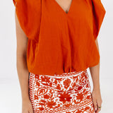 J. Marie | The Layne Top- Burnt Orange V-Neck Solid