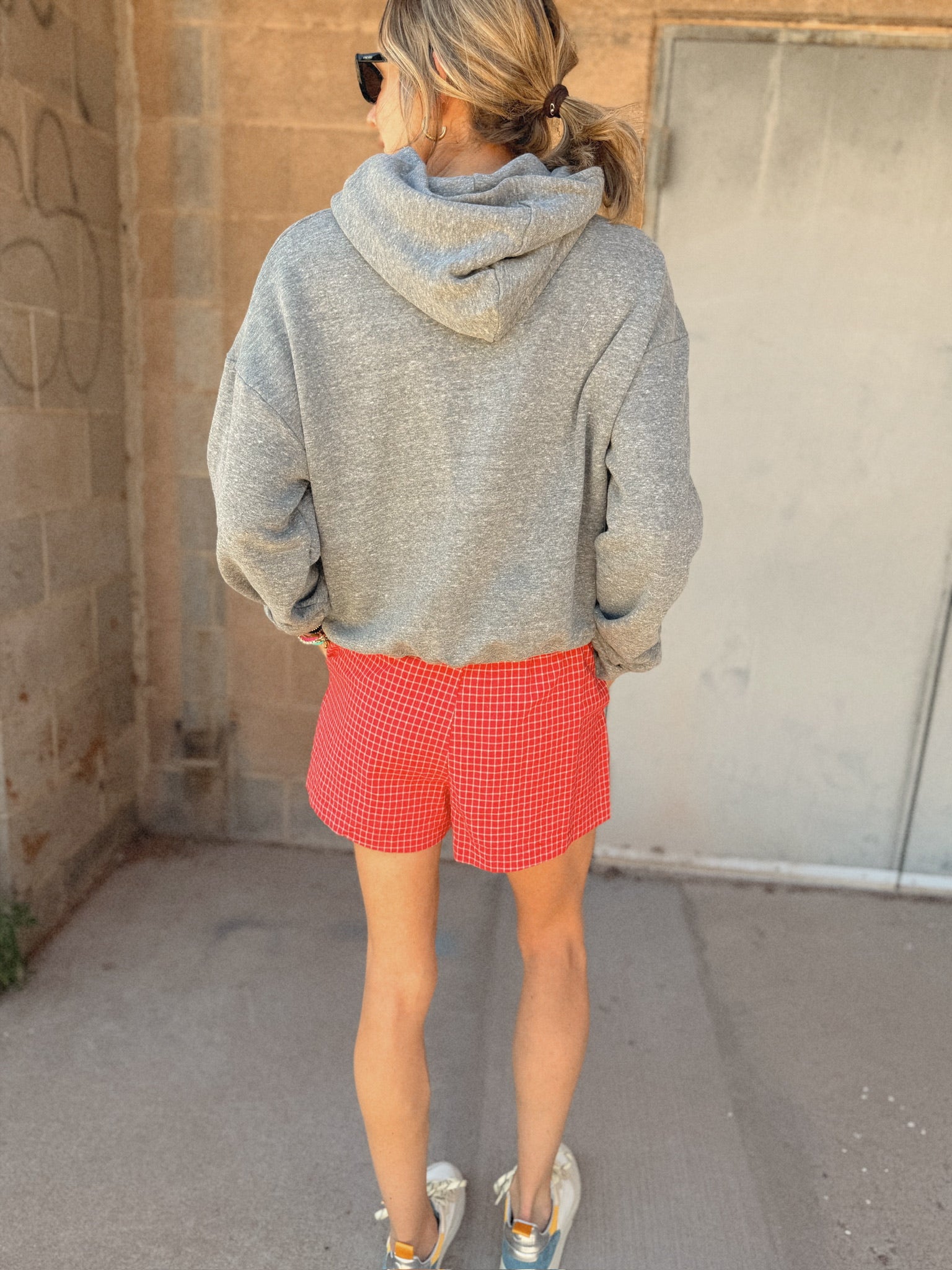 Buttermelon Red Checkered Boxer Shorts styled with a Sunny Somewhere graphic sweatshirt for summer from Shop Estilo.